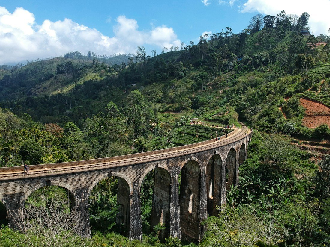 Sri Lanka’s Nine Arch Bridge surrounded by green hills